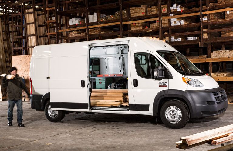 white 2016 Ram ProMaster loaded with supplies in a factory