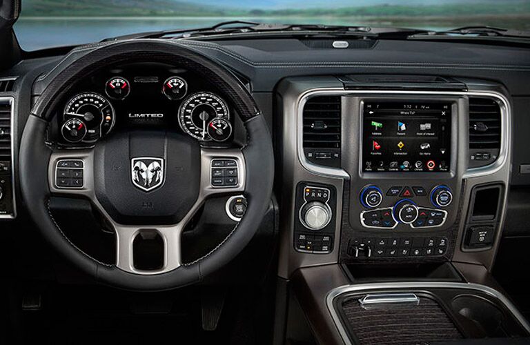 steering wheel and dashboard view of the 2017 Ram 1500 Limited