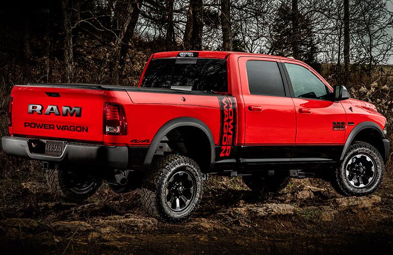 side view of a red 2017 Ram 2500 Power Wagon parked in the woods