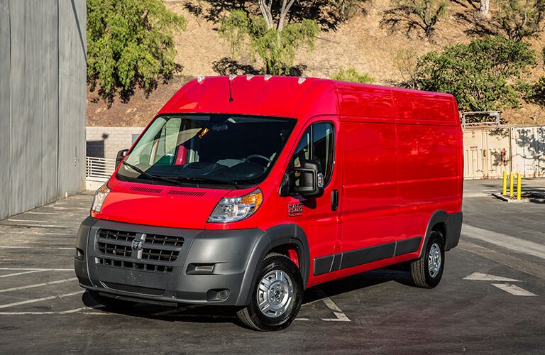 red 2017 Ram ProMaster Cargo Van looking stylish in a parking lot