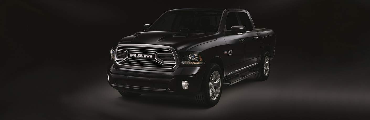 black 2018 Ram Limited Tungsten Edition (like those that will be arriving soon in Lake Elmo MN) on a black background