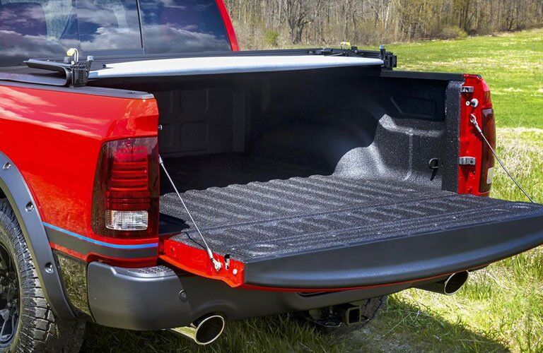 Ram truck rear liftgate with a spray in bedliner in the bed