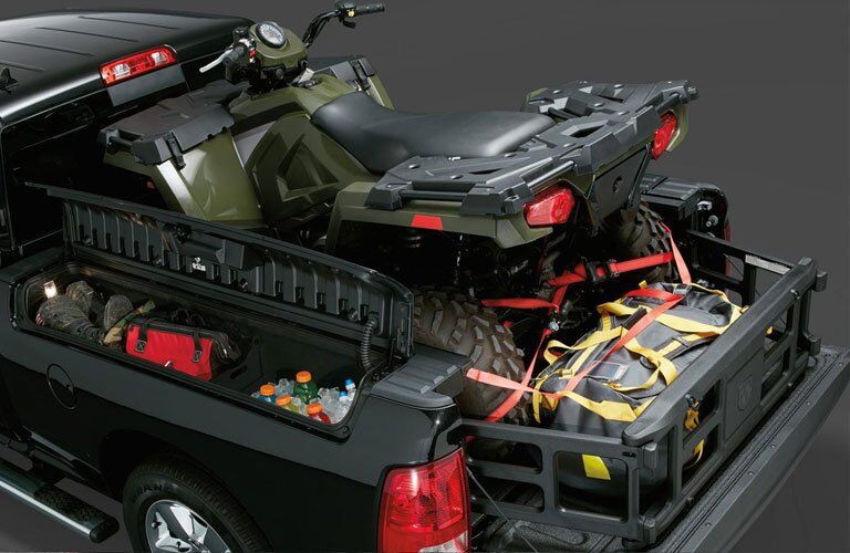 rear of a Ram truck loaded with stuff