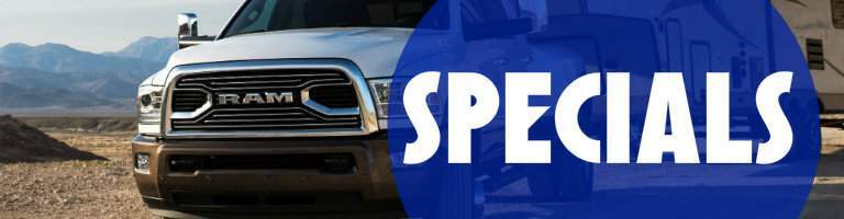 front view of a Ram truck with the word "Specials" on a blue background