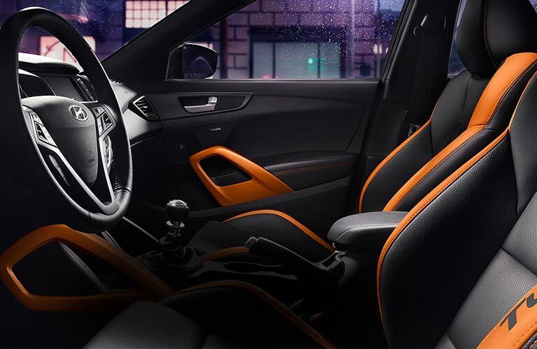 Front seats and steering wheel of 2017 Hyundai Veloster Front seats and steering wheel of 2017 Hyundai Veloster