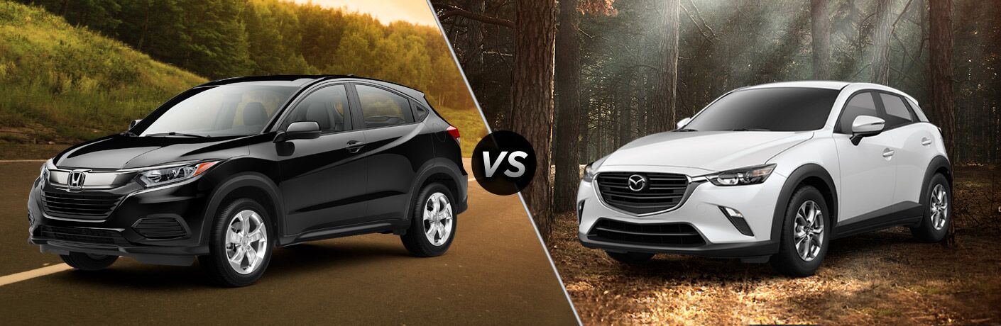 2019 Honda HR-V exterior front fascia and drivers side next to grassy hill vs 2019 Mazda CX-3 exterior front fascia and drivers side in woods