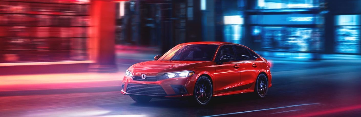 2023 Honda Civic Sedan on the road at night