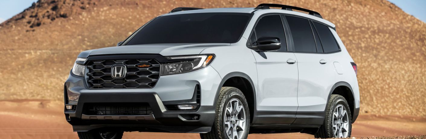 Front-side profile of the 2023 Honda Passport Gray