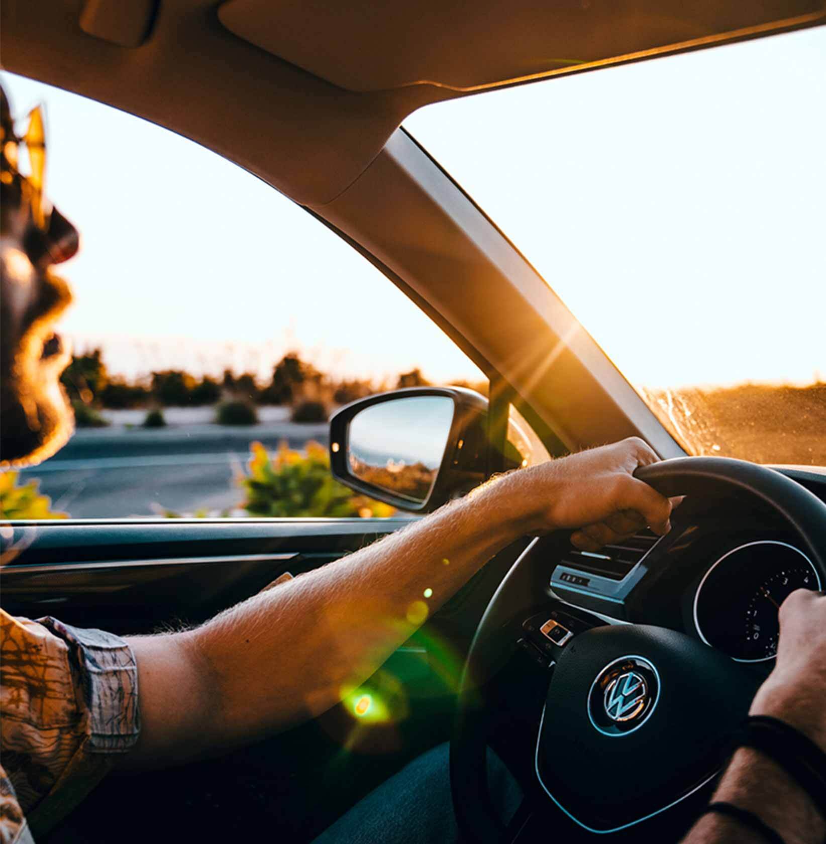 3 Months of Sirius XM Person driving Volkswagen on road