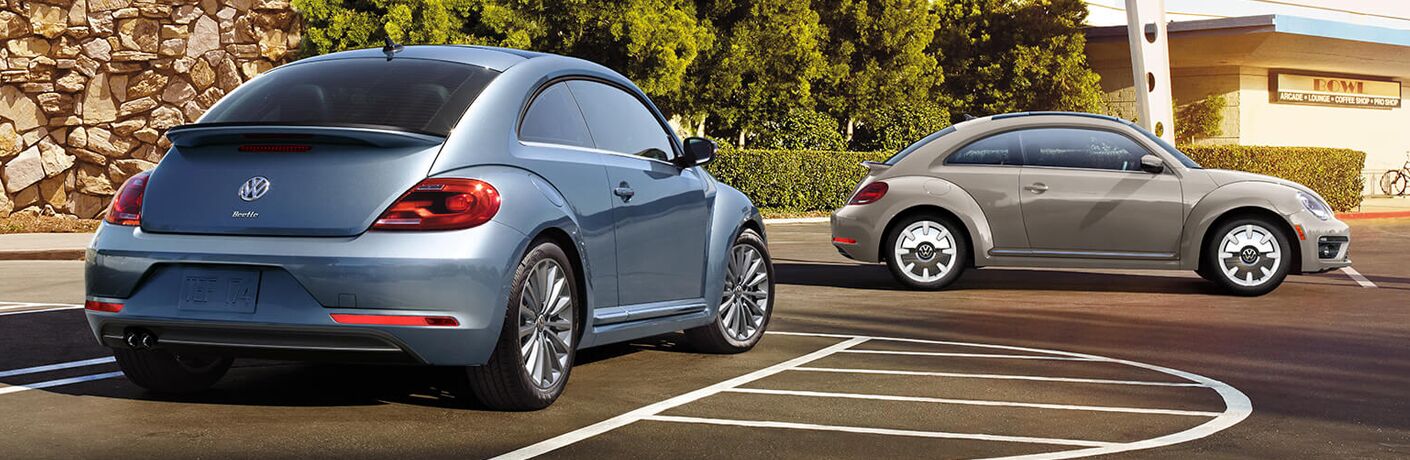 2019 Volkswagen Beetle models parked near each other in a lot