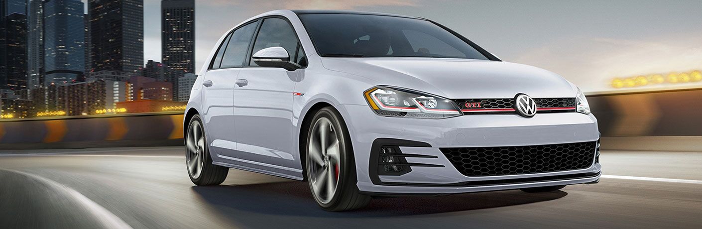 2020 Volkswagen Golf GTI driving on a road