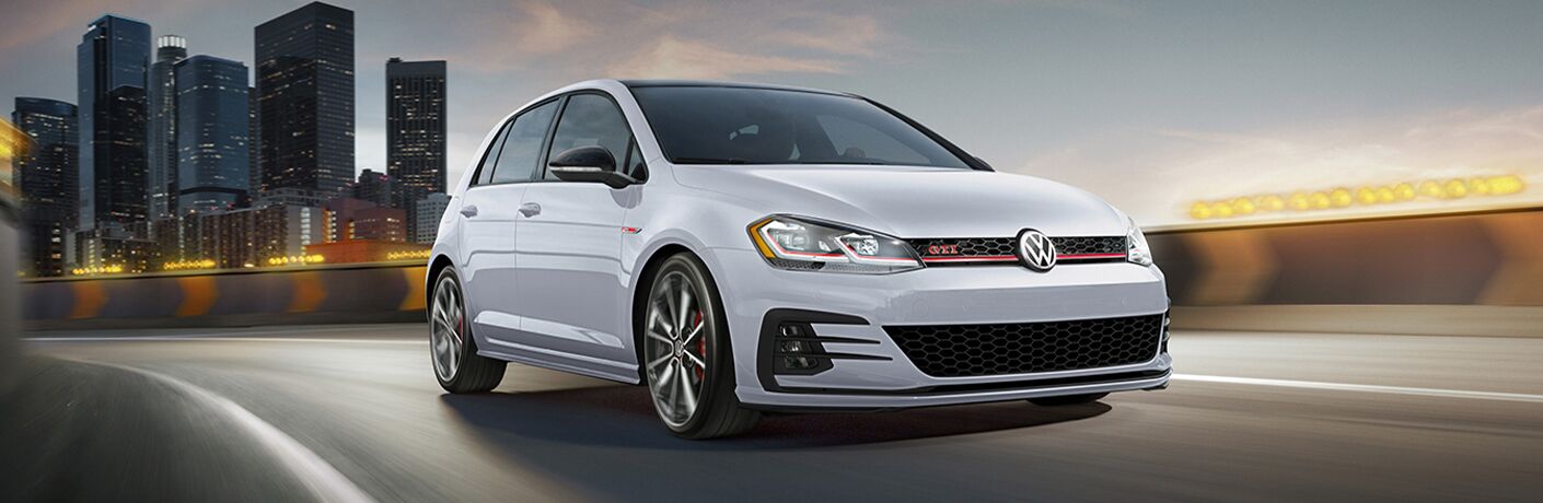 2021 Volkswagen Golf GTI driving on a road