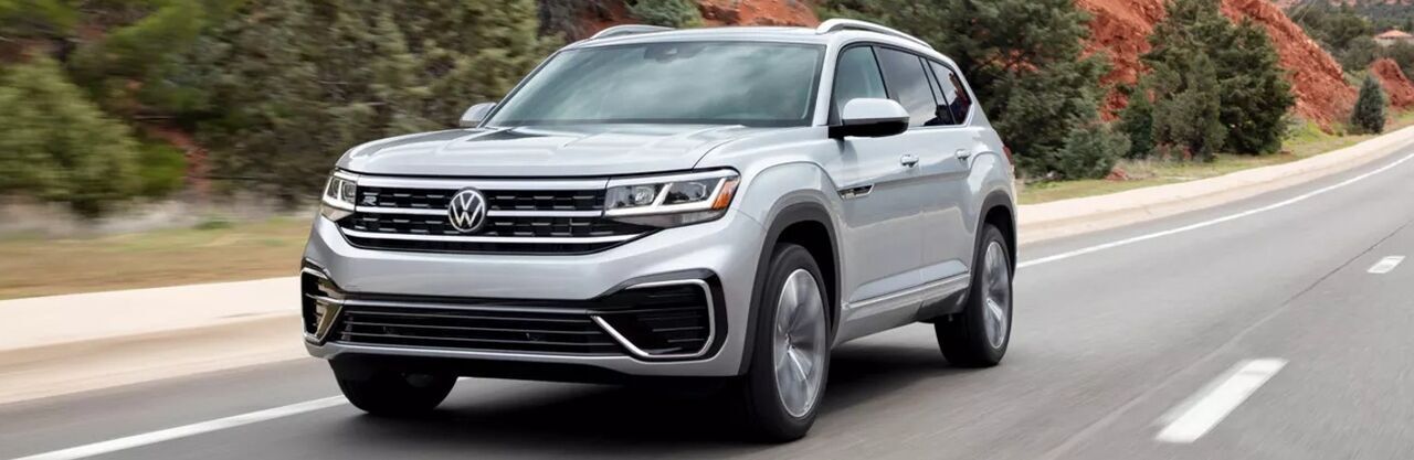 2022 VW Atlas Gray driving on the road