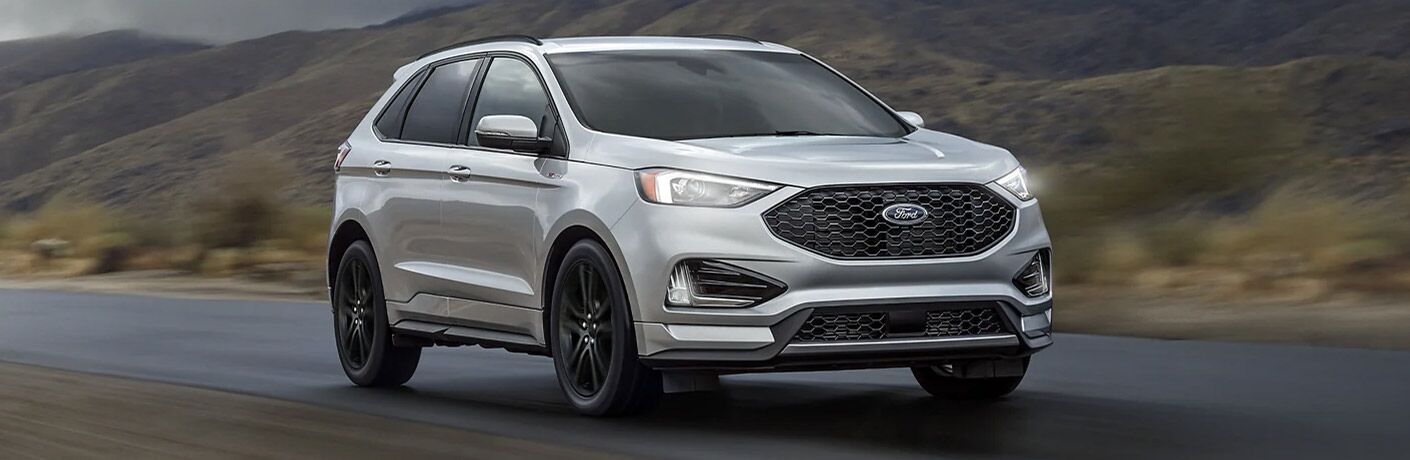2021 Ford Edge driving down a rural road 2021 Ford Edge driving down a rural road