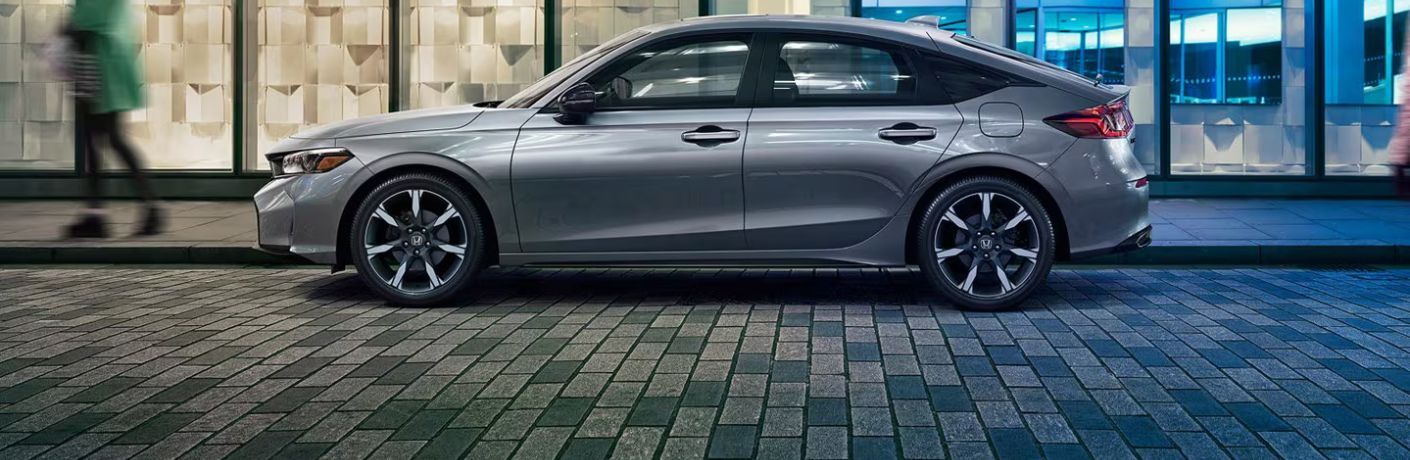 Side view of the 2026 Honda Civic Hatchback Gray
