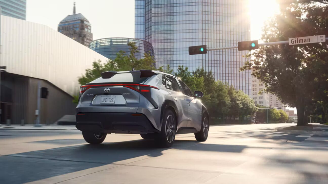 2023 Toyota bZ4X Limited AWD shown in Heavy Metal with Black roof and available split roof rear spoiler. Prototype shown with options. 2023 Toyota bZ4X Limited AWD shown in Heavy Metal with Black roof and available split roof rear spoiler. Prototype shown with options.