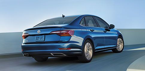 Tires with 24-Month Road Hazard Coverage Volkswagen Jetta driving on ramp