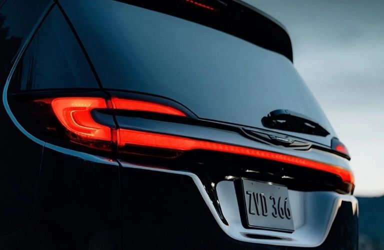 Used Chrysler Pacifica Black showing its LED taillamps Used Chrysler Pacifica Black showing its LED taillamps