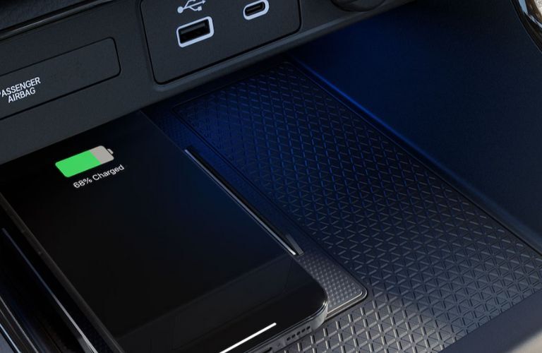 a phone getting charged wirelessly in the 2026 Honda CR-V
