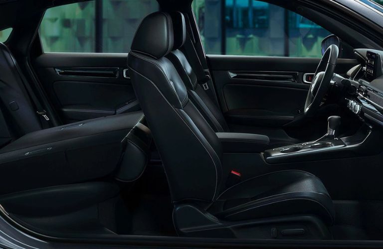 2026 Honda Civic Hatchback Sport Touring Hybrid shown with black leather
