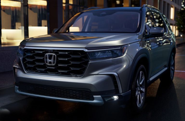 front quarter view of the 2025 Honda Pilot on the road