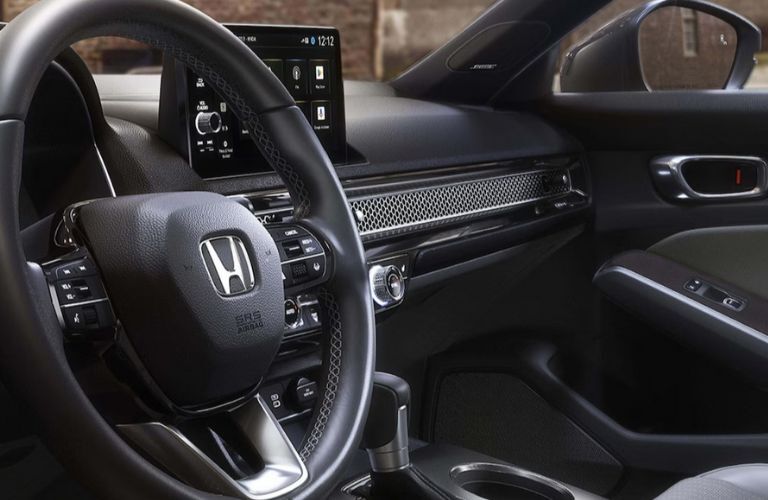 close up of the 2026 Honda Civic Hatchback steering wheel