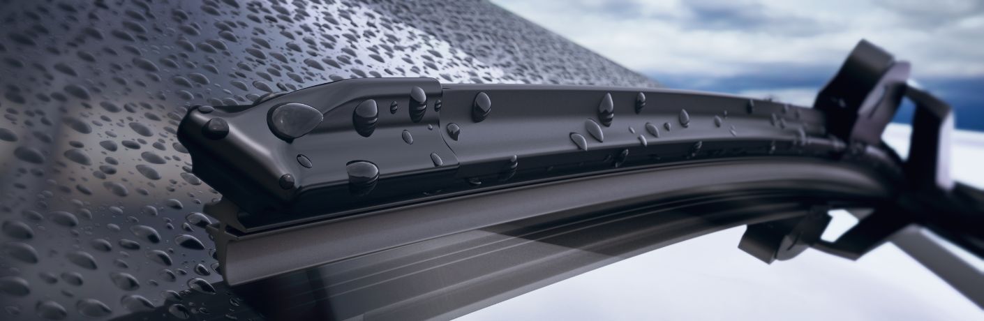 Representative image of a wiper arm on a rainy surface