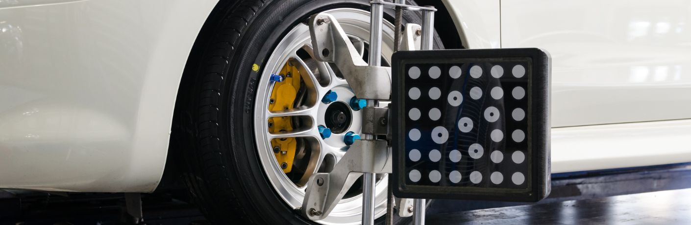 Tire balancing being undertaken at a service center