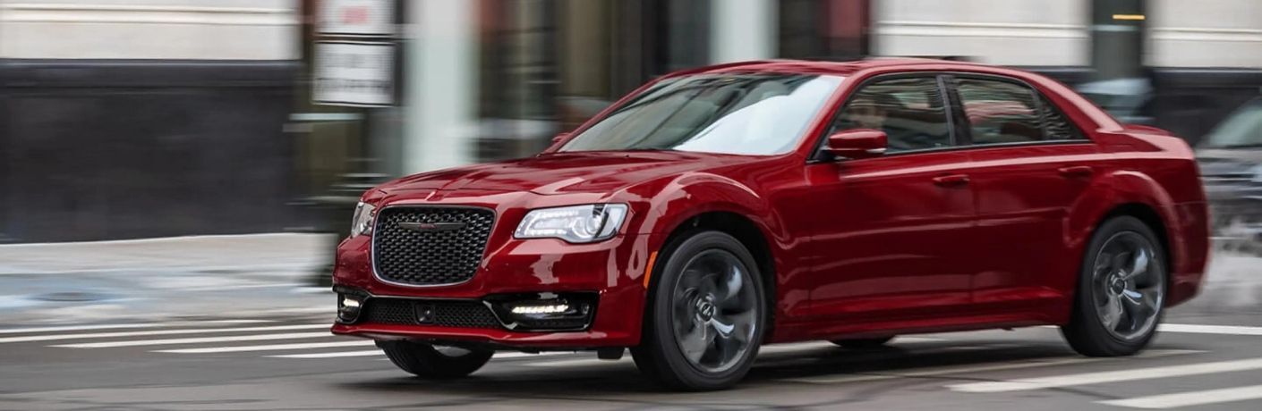 Used Chrysler 300 Red moving on the road Used Chrysler 300 Red moving on the road