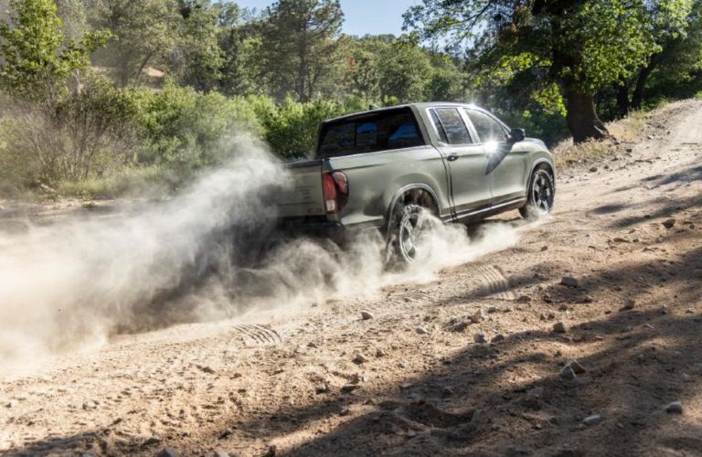 side view of a 2026 Honda Ridgeline off-roading
