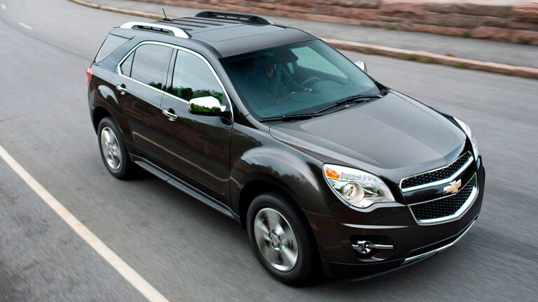 Black 2015 Chevy Equinox on the road