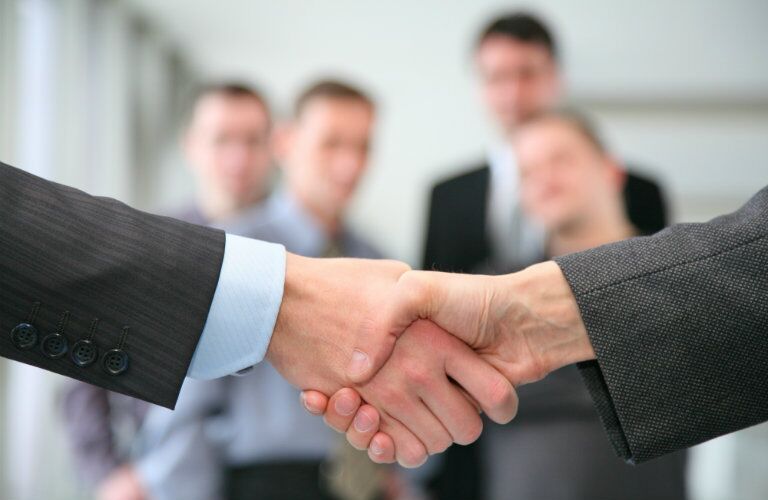 Shaking hands over a Yemm vehicle exchange