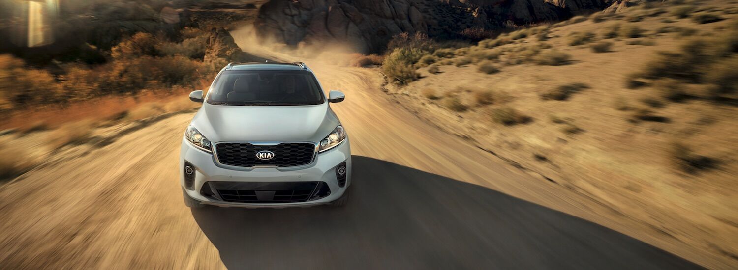 2019 Kia Sorento A gold 2019 Kia Sorento driving through the desert