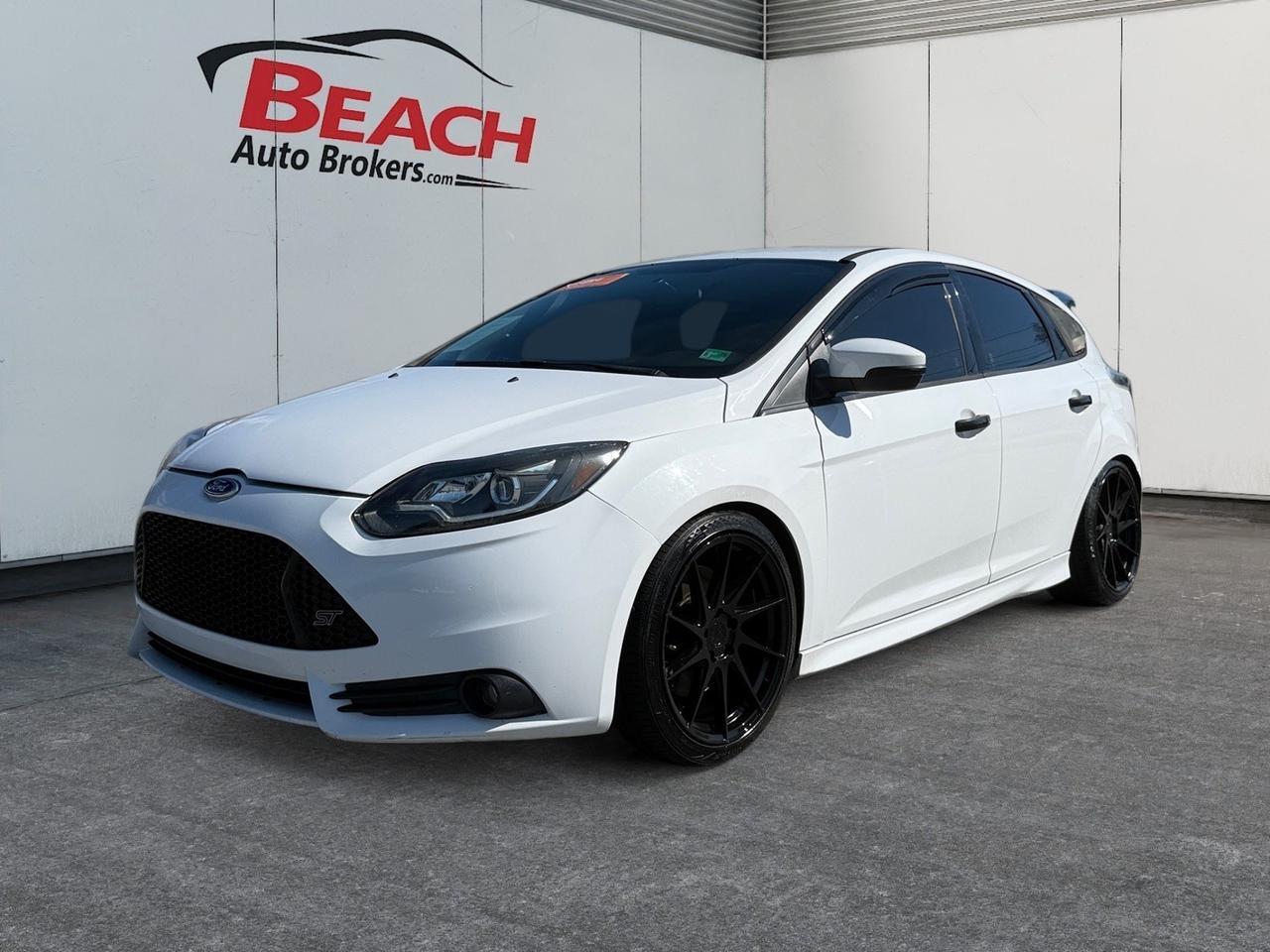 2014 Ford Focus ST, KEYLESS ENTRY, PUSH BUTTON START, POWER MIRRORS, ALL WEATHER FLOOR MATS, USB, AUX, BLUETOOTH, BLACK WHEELS, REAR SPOILER, LEATHER WRAPPED STEERING WHEEL, COMPACT BUT SPACIOUS - A CAR THAT FITS YOUR LIFE AND YOUR BUDGET! 2014 Ford Focus ST, KEYLESS ENTRY, PUSH BUTTON START, POWER MIRRORS, ALL WEATHER FLOOR MATS, USB, AUX, BLUETOOTH, BLACK WHEELS, REAR SPOILER, LEATHER WRAPPED STEERING WHEEL, COMPACT BUT SPACIOUS - A CAR THAT FITS YOUR LIFE AND YOUR BUDGET!