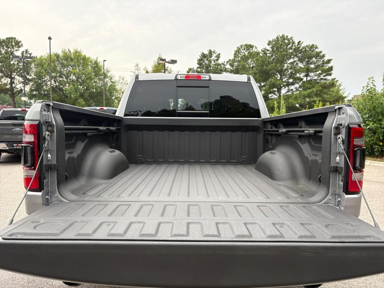 2019 Ram 1500 Rebel, CUSTOM PRO COMP WHEELS, RUNNING BOARDS, TOW PACKAGE, BACKUP CAMERA, LANE KEEP ASSIST, BLIND SPOT ALERT, HEATED SEATS, HEATED STEERING WHEEL, APPLE CARPLAY/ANDROID AUTO, LOW MILES, CLEAN CARFAX, RULE THE ROAD IN A REBEL! Virginia Beach VA 2019 Ram 1500 Rebel, CUSTOM PRO COMP WHEELS, RUNNING BOARDS, TOW PACKAGE, BACKUP CAMERA, LANE KEEP ASSIST, BLIND SPOT ALERT, HEATED SEATS, HEATED STEERING WHEEL, APPLE CARPLAY/ANDROID AUTO, LOW MILES, CLEAN CARFAX, RULE THE ROAD IN A REBEL! Virginia Beach VA