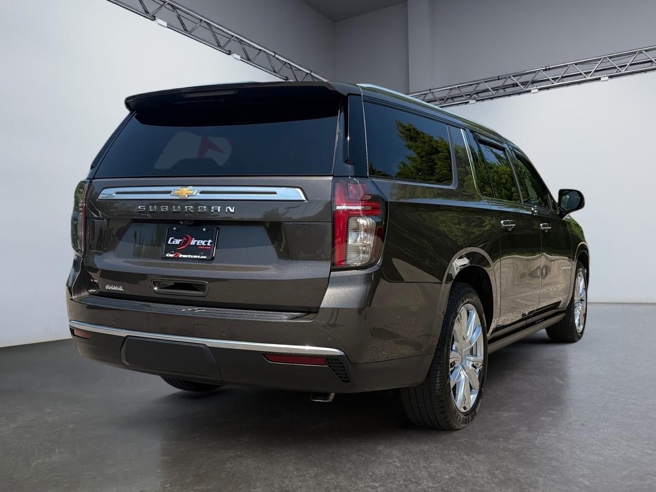 2021 Chevrolet Suburban High Country, HEADS-UP DISPLAY, POWER RUNNING BOARDS, POWER LIFTGATE, BLIND SPOT ALERT, LANE KEEP ASSIST, PANORAMIC MOONROOF, APPLE CARPLAY/ANDROID AUTO, 360 BACKUP CAMERA, HEATED & COOLING SEATS, REAR DVD ENTERTAINMENT, LOW MILES, THIS SUV HAS IT AL Virginia Beach VA 2021 Chevrolet Suburban High Country, HEADS-UP DISPLAY, POWER RUNNING BOARDS, POWER LIFTGATE, BLIND SPOT ALERT, LANE KEEP ASSIST, PANORAMIC MOONROOF, APPLE CARPLAY/ANDROID AUTO, 360 BACKUP CAMERA, HEATED & COOLING SEATS, REAR DVD ENTERTAINMENT, LOW MILES, THIS SUV HAS IT AL Virginia Beach VA