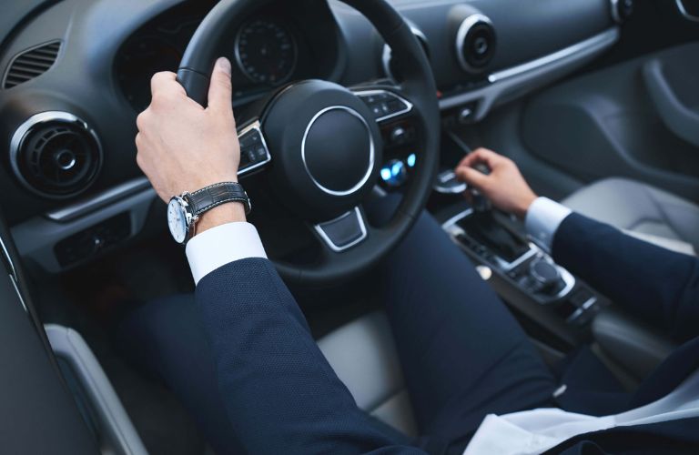 a young man test driving a car