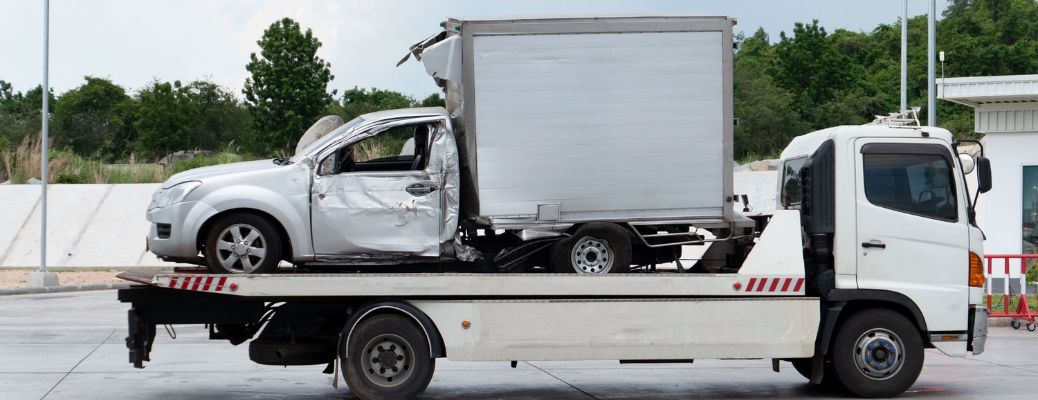 Vehicle being towed after a car accident