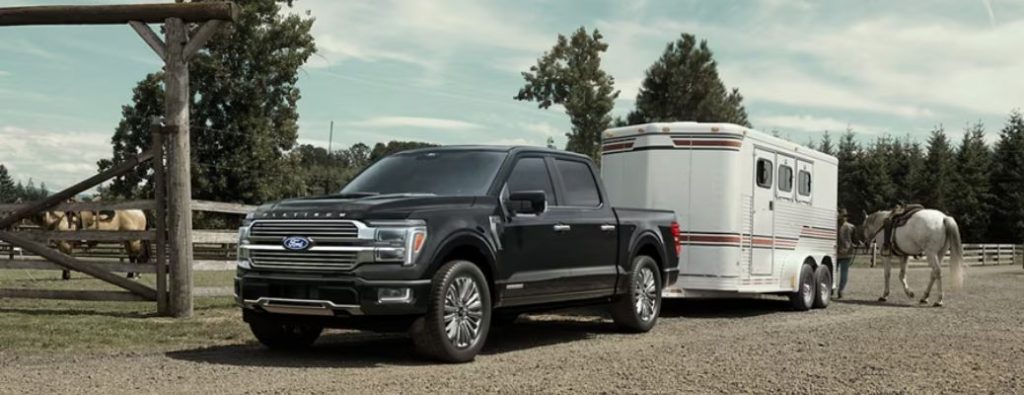 A Ford F-150 towing a trailer