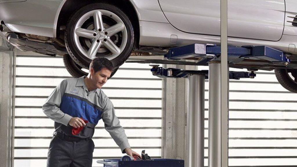 Technician working on a vehicle