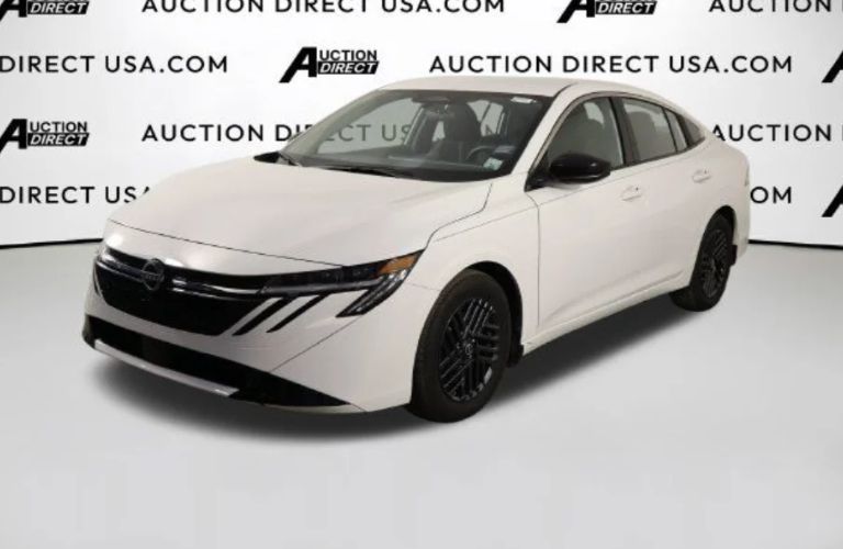 front and side view of a used sedan at the dealerhsip