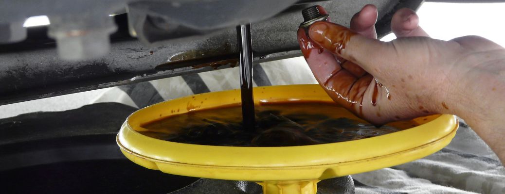 A mechanic working on a vehicle