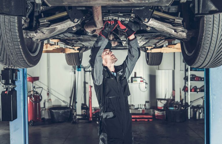 Mechanic checking a vehicle