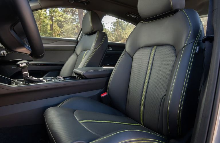 2026 Kia K5 black front seats with neon green stitching