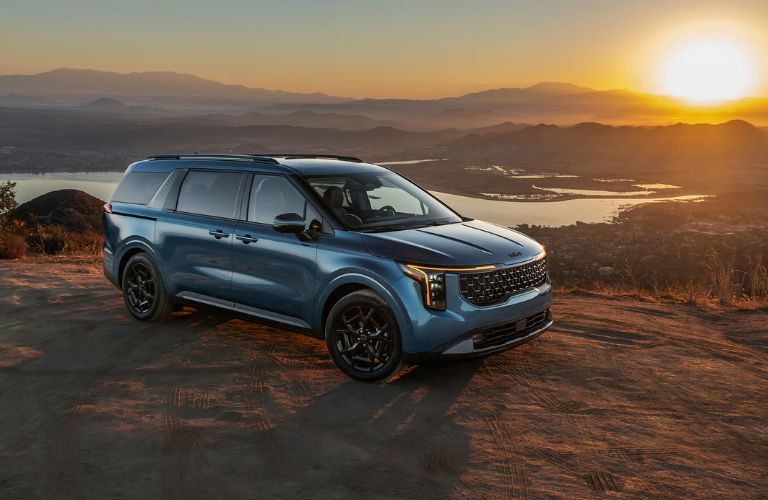 2026 Kia Carnival MPV side and front angle