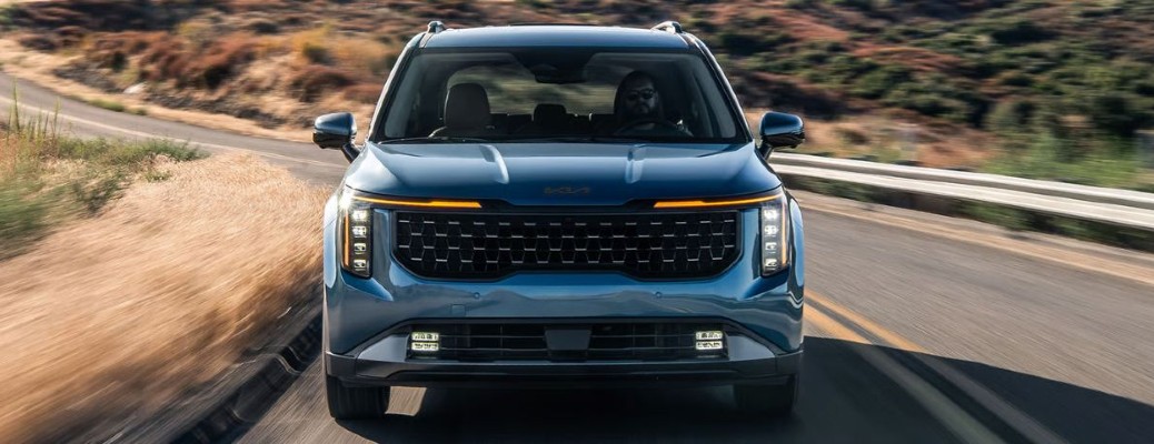 2026 Kia Carnival front view on a road