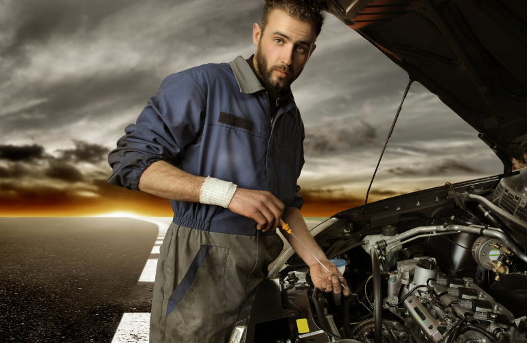 Mechanic inspecting a vehicle 