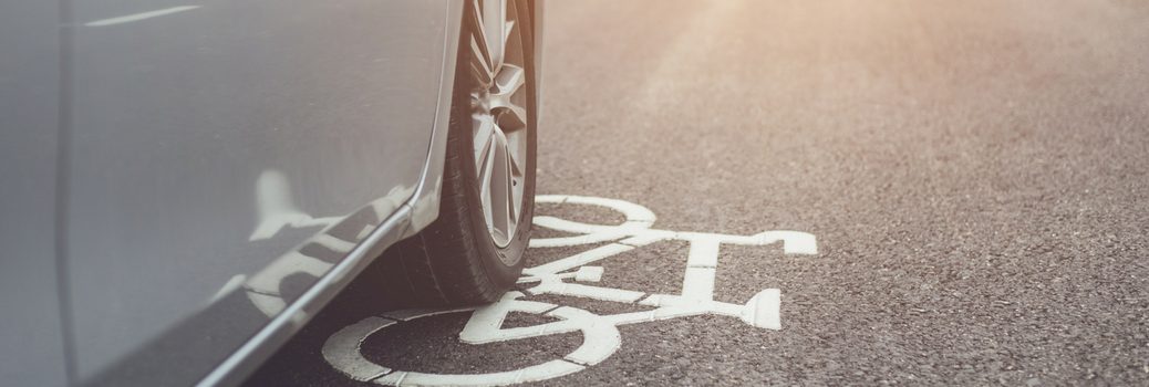 car-driving-next-to-bike-lane