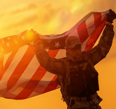 military perosn holding the flag