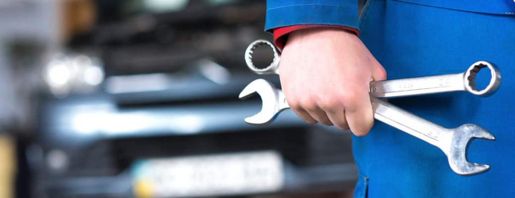 Technician posing with tools